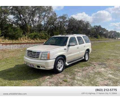 2004 Cadillac Escalade for sale is a White 2004 Cadillac Escalade Car for Sale in Haines City FL