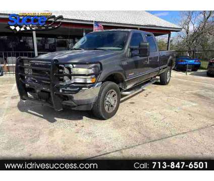 2003 Ford F350 Super Duty Crew Cab for sale is a Grey 2003 Ford F-350 Super Duty Car for Sale in Houston TX