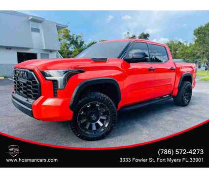 2022 Toyota Tundra Hybrid CrewMax for sale is a Red 2022 Toyota Tundra 1794 Trim Hybrid in Fort Myers FL