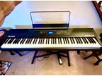 Alesis Recital Pro electronic keyboard with stand