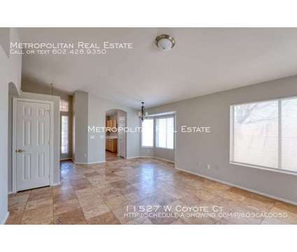 SPACIOUS home in Surprise at 11527 W Coyote Ct in Surprise AZ is a Home