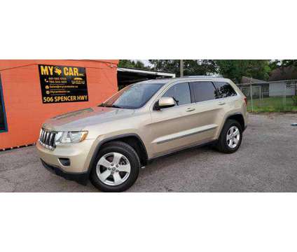 2011 Jeep Grand Cherokee for sale is a Tan 2011 Jeep grand cherokee Car for Sale in South Houston TX