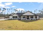 9708 Sweetfield Ln, Southport, FL 32409