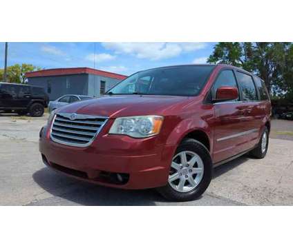 2010 Chrysler Town &amp; Country for sale is a Red 2010 Chrysler town &amp; country Car for Sale in Orlando FL