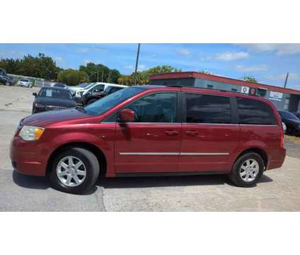 2010 Chrysler Town &amp; Country for sale is a Red 2010 Chrysler town &amp; country Car for Sale in Orlando FL