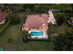 6821 N Woodridge Dr, Parkland, FL 33067