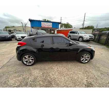2017 Hyundai Veloster for sale is a Black 2017 Hyundai Veloster 2.0 Trim Car for Sale in Houston TX
