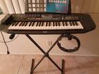 Electronic keyboard and stand