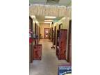 Business For Sale: 10 Bed Tanning Salon & Gift Boutique