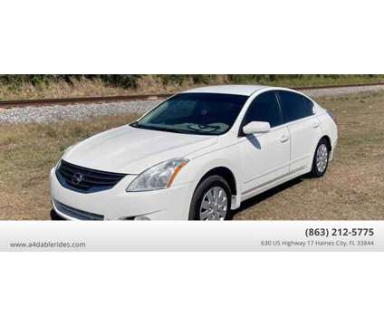 2012 Nissan Altima for sale is a White 2012 Nissan Altima 2.5 Trim Car for Sale in Haines City FL