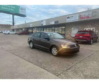 2014 Volkswagen Jetta for sale is a Brown 2014 Volkswagen Jetta 2.5 Trim Car for Sale in Fort Worth TX
