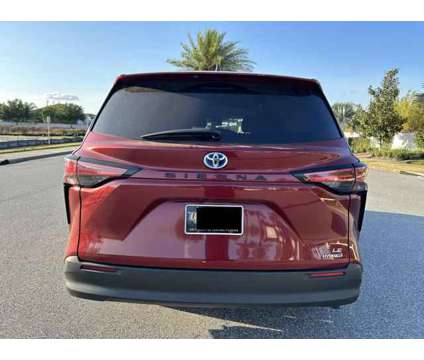 2021 Toyota Sienna for sale is a Red 2021 Toyota Sienna Car for Sale in Kissimmee FL