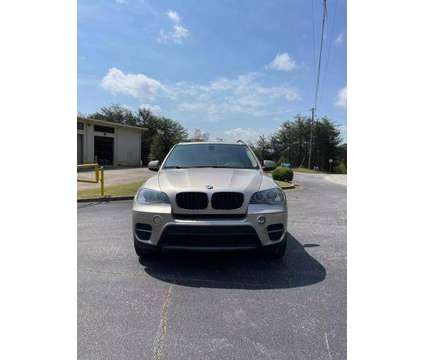 2013 BMW X5 for sale is a Silver 2013 BMW X5 3.0si Car for Sale in Cumming GA