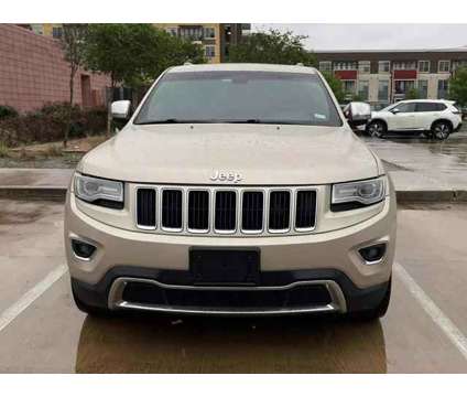 2014 Jeep Grand Cherokee for sale is a Tan 2014 Jeep grand cherokee Car for Sale in Houston TX