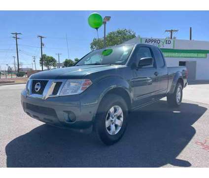 2013 Nissan Frontier King Cab for sale is a Blue 2013 Nissan frontier King Cab Car for Sale in El Paso TX