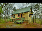 Ellijay, Check out this 3BR/2.5BA cabin on 26.42 acres.