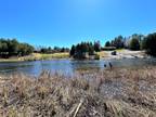Cheboygan, black river 3.7 acre waterfront lot for sale with