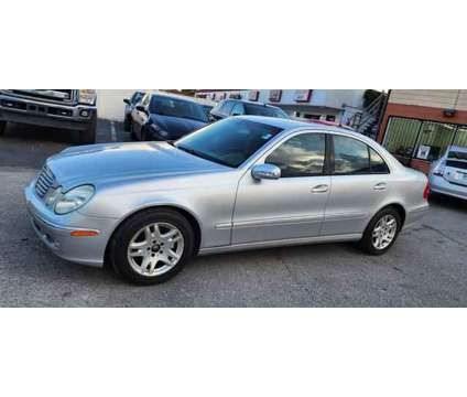 2003 Mercedes-Benz E-Class for sale is a Silver 2003 Mercedes-Benz E Class Car for Sale in Tampa FL