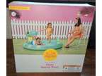New/Sealed by Sun Squad, Dino Inflatable Spray Pool for
