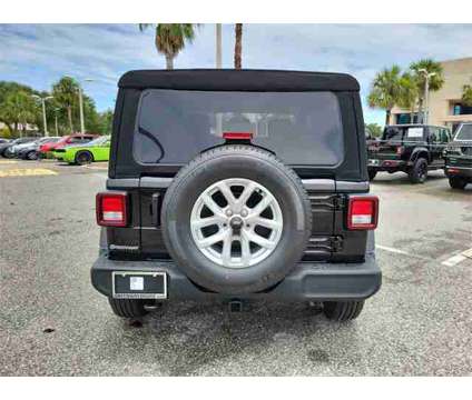 2023 Jeep Wrangler Sport S is a Black 2023 Jeep Wrangler Sport Car for Sale in Orlando FL