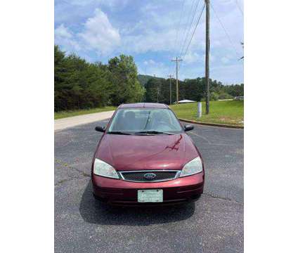 2007 Ford Focus for sale is a Red 2007 Ford Focus Car for Sale in Cumming GA