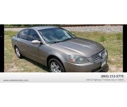 2005 Nissan Altima for sale is a Gold 2005 Nissan Altima 2.5 Trim Car for Sale in Haines City FL
