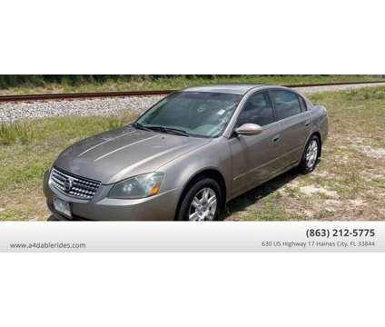 2005 Nissan Altima for sale is a Gold 2005 Nissan Altima 2.5 Trim Car for Sale in Haines City FL