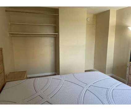 Spacious Newly Furnished Bedroom with Utilities at 120 De Kruif Place Bronx in New York NY is a Roommate