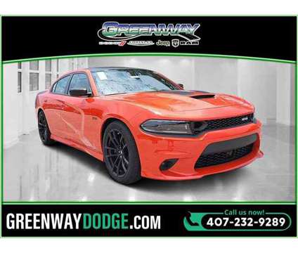 2023 Dodge Charger R/T Scat Pack is a Gold 2023 Dodge Charger R/T Car for Sale in Orlando FL