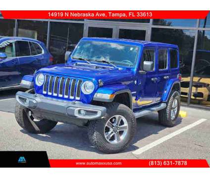 2018 Jeep Wrangler Unlimited for sale is a Blue 2018 Jeep Wrangler Unlimited Car for Sale in Tampa FL