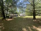 Gladwin, Over 3/4 acre to enjoy. Shady lot with 17 acre