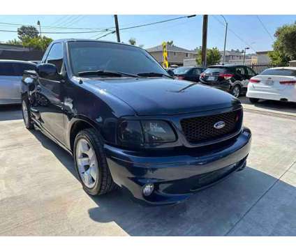 2002 Ford F150 Regular Cab for sale is a Blue 2002 Ford F-150 Car for Sale in Perris CA