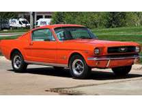 Red 1965 Ford Mustang Fastback