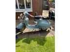 1964 baby blue vespa