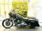 2005 Harley-Davidson Touring Road king with batwing fairing.