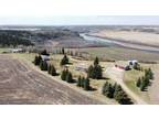 BEAUTIFUL RIVERFRONT 1/4 with stunning panoramic views of the Red Deer River