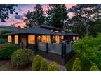 Luxurious home situated on a sunny lot in desirable in Oak Bay