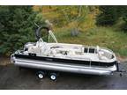 New 24 ft. pontoon boat with 115 Mercury and dual bunk