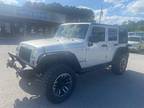 2009 Jeep Wrangler Unlimited Sahara 4x4 4dr SUV w/ Front Side Airbags