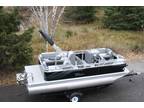 New 1975 Quad Lounge pontoon boat with 25 hp and trailer