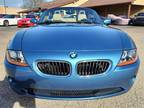 2003 BMW Z4 maldives blue metallic with black soft top