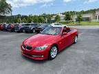 2011 BMW 328i hard top convertible with 67,557 miles