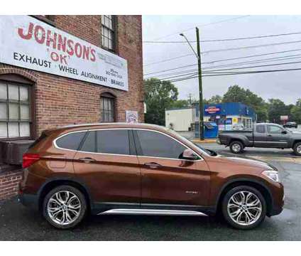 2016 BMW X1 for sale is a Brown 2016 BMW X1 Car for Sale in Delmar DE