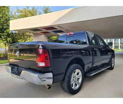 2017 Ram 1500 Quad Cab for sale is a Brown 2017 RAM 1500 Model Car for Sale in Houston TX
