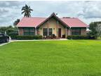 813 NE 2nd St, Belle Glade, FL 33430