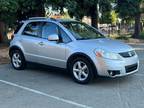 2009 Suzuki SX4 Crossover Base AWD 4dr Crossover 4A w/Touring Package