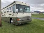 2000 Country Coach Intrigue 350hp 40' Slide