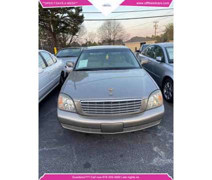 2002 Cadillac DeVille for sale is a Tan 2002 Cadillac DeVille Car for Sale in Lilburn GA