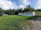 Ranch style mobile home located on.75 acres
