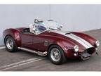 1965 Shelby Cobra Metallic Red with Silver Stripes